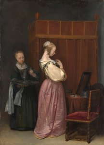 Una giovane donna ha la sua toilette