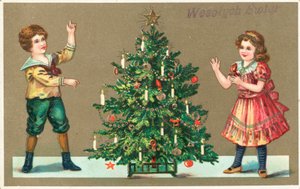 Ragazza e ragazzo con albero di Natale da German School