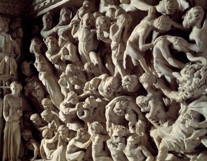 Dettaglio dei rilievi della Cattedra realizzata da Giovanni Pisano: i dannati (dettaglio)