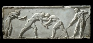 Arte greca: base di kouros rappresentante lottatori durante un combattimento
