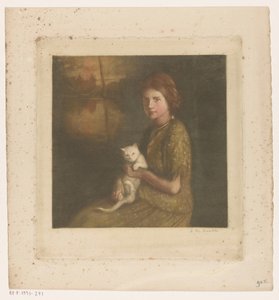 Ragazza con un gatto in grembo