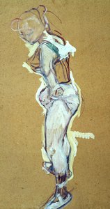 Artista del trapezio che si sistema la camicia