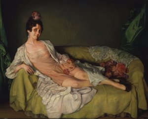 Donna sdraiata su una poltrona in combinazione e vestaglia da Ignacio Zuloaga y Zabaleta