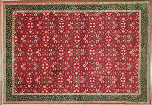Tappeto Mughal con disegno a fiori e reticolo, Nord Indiano da Indian School