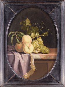 Pesche, uva e noci su un ripiano drappeggiato da Isaak Denies