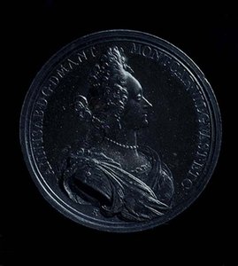 Dritto di una medaglia ritratto di Anna Isabella di Mantova, coniata nel 1698. Iscrizione: ANN-I SAB- D G MANT MONT CAR VIL GVAST ET C