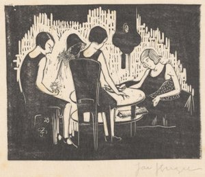 Quattro donne sedute a un tavolo