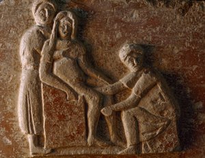 Rilievo dalla tomba di un uomo e una donna romani che mostra una donna che partorisce. Museo Archeologico