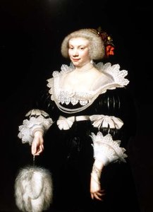 Ritratto di una signora in un vestito nero con colletto e polsini di pizzo da Jan Anthonisz. van Ravesteyn