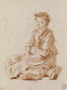 Bambina seduta per terra