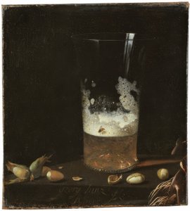 Natura morta con bicchiere di birra e noci da Johann Georg Hainz