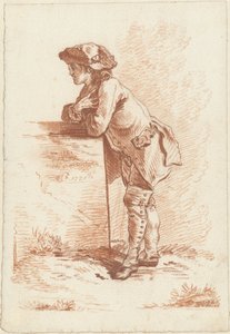 Giovane che si appoggia a una pietra