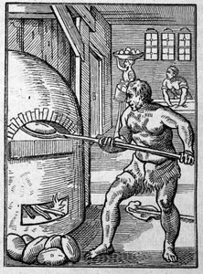 Un fornaio che cuoce il pane in un forno. Incisione di Jost Amman (1539-1591) XVI secolo. da Jost Amman