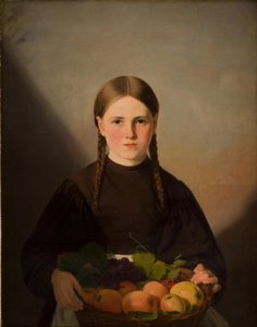 Una ragazza con un cesto di frutta