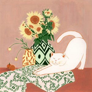 Gatti felici tra i girasoli
