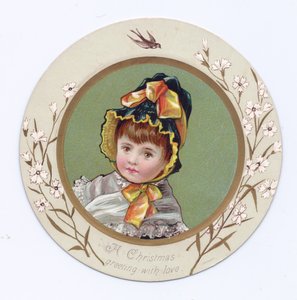 Cartolina vittoriana di auguri di un ragazzo con il braccio intorno a una ragazza che guarda un libro, c.1880