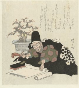 Uomo che scrive in kimono nero