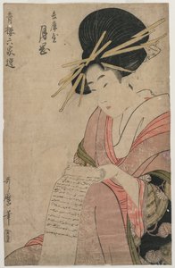 La cortigiana Tsukioka di Hyogoya che arrotola una lettera da Kitagawa Utamaro