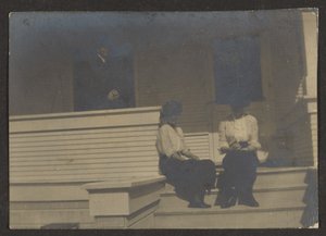 [Figure in veranda]