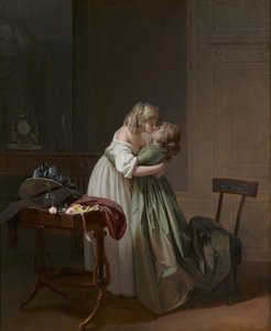 Due giovani donne che si baciano