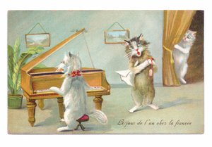 Cartolina edoardiana di un gatto che suona il pianoforte e l