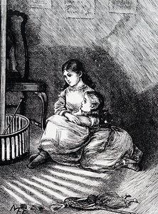 Bambini seduti accanto al focolare