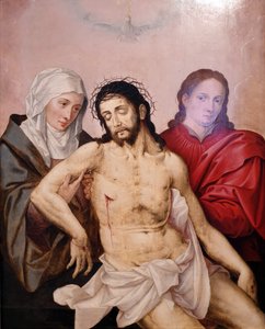 Il corpo di Gesù tenuto in mano da Maria e Giovanni