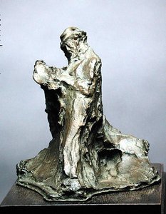 Uomo che legge da Medardo Rosso