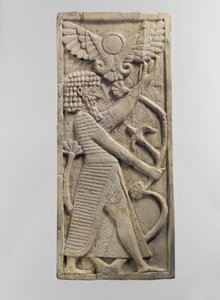 Placca di mobilio scolpita in rilievo con una figura maschile che afferra un albero, c.VIII secolo a.C. da Neo Assyrian Neo Assyrian