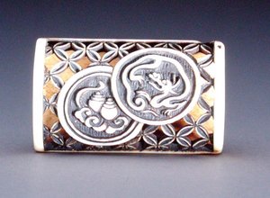 Netsuke con design a traforo (c.1870)