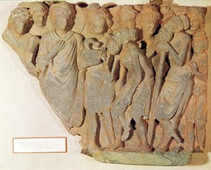 La Vittoria sul Serpente, rilievo che raffigura Buddha che presenta il serpente temuto ai Brahmani stupiti, stile greco-buddhista, I-IV secolo