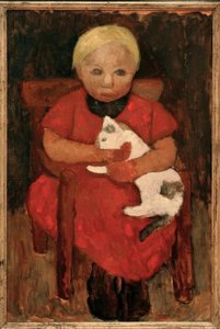 Bambino contadino seduto con gatto