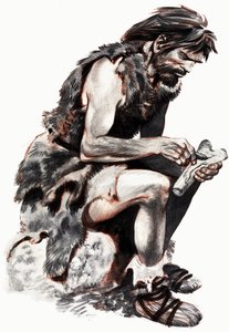 Uomo delle caverne che intaglia un osso