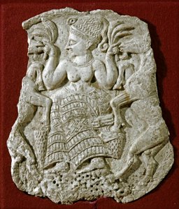 Arte fenicia: coperchio di pisside scolpito in avorio, rappresentante una dea della fertilità micenea che nutre capre. Intorno al 1250 a.C. Da Twink El Beida. Parigi, Museo del Louvre