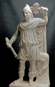 Civiltà fenicia: divinità mitriaca con torcia e doppia ascia da Phoenician Phoenician