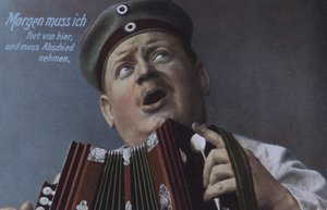Soldato tedesco che suona una fisarmonica (foto colorata)