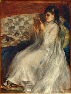 Giovane donna che legge in bianco