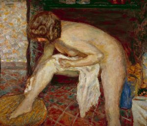 Nudo alla sua toilette davanti al camino
