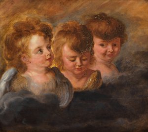 Tre teste di angelo tra le nuvole