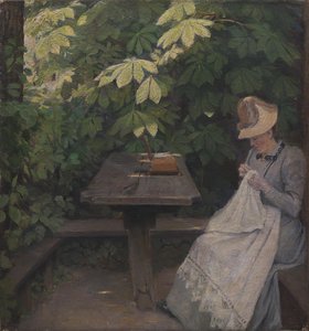 Una signora in abiti estivi in un padiglione