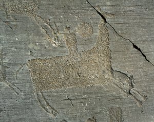 Preistoria, civiltà Camunni, arte rupestre: roccia tombale raffigurante un guerriero a cavallo con uno scudo. Periodo tra il Neolitico e l