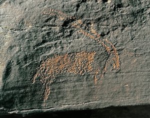 Preistoria, arte rupestre: roccia tombale con la rappresentazione di un