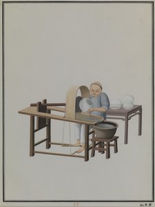 Un fabbricante di pesciolini in vetro da Qua Pu