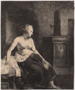 Una donna seminuda seduta accanto alla stufa da Rembrandt van Rijn