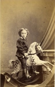 Bambino seduto su un cavallo a dondolo, 1860s da Robert H. Preston