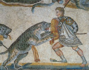 Mosaico che mostra una scena di caccia alle bestie selvatiche, dettaglio di un gladiatore che uccide un animale selvatico