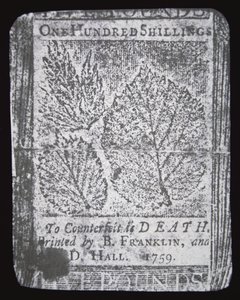 Una banconota da 100 scellini progettata e stampata da Benjamin Franklin nel 1759 da School American