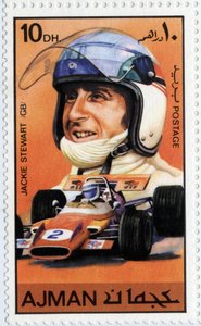 Francobollo degli Emirati Arabi Uniti che rappresenta il pilota automobilistico scozzese Jackie Stewart (nato nel 1939) da School Arabic
