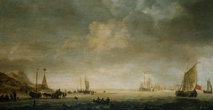 La riva a Scheveningen con pescatori sulla spiaggia