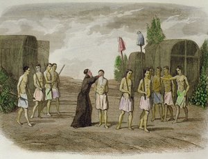 Uno schiavo indigeno della tribù Tupinamba viene battezzato da un prete gesuita, vicino a Bahia nel 1550